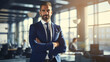 © Keitma - Confident Middle-Eastern businessman in a suit standing in an office