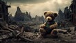 War background with destroyed city buildings - Teddy bear sits on the ruins of a bombed city