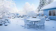 Back Yard Of House, Trees And Standing Outdoor Furniture Covered In Snow. Snowy Winter Day. 
