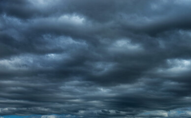 Wall Mural - Background of stormy rain clouds