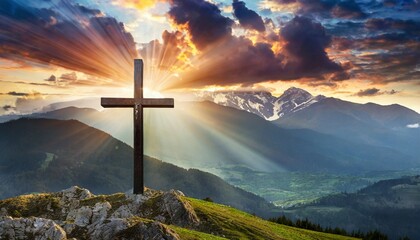 Wall Mural - jesus christ cross easter resurrection concept christian cross on a background with dramatic lighting colorful mountain sunset dark clouds and sky and sunbeams