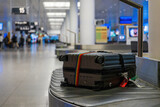 Fototapeta  - Suitcase or luggage with conveyor belt in the airport.