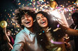 © PRASANNAPIX - young Indian couple, are laughing and joyful dancing at party