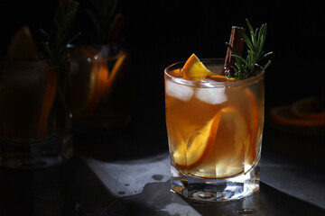 Wall Mural - Orange rosemary bourbon cocktail in low key