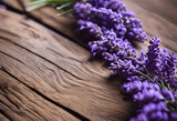 Fototapeta Lawenda - Lavender flowers close-up on a rustic wooden table.