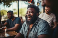African American man enjoying a moment of laughter with friends