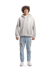 Sticker - Full length portrait of a guy with curly hair in a gray hoodie and jeans