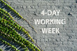 4 - Day working week on a brick wall