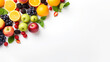 Top view of assorted fresh fruits on a clean white background
