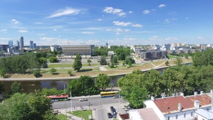 Wall Mural - Aerial view of Vilnius with Neris river and modern city skyline, Lithuania