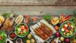 summer bbq or picnic food double side border over a rustic wood banner background various grilled meats vegetables fruits salad and potatoes above view with copy space