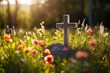  Funeral and mourning concept. Cross grave surrounded by flowers. 