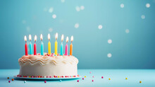 Birthday Cake With 6 (six) Candles On Pastel Blue Background With Copy Space