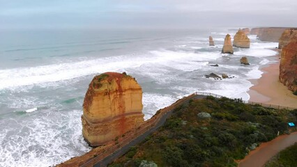 Poster - Panoramic aerial shoot of Twelve Apostles coastline from drone at dusk, Australia