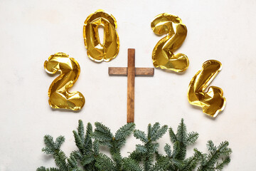 Wall Mural - Cross with fir branches and figure 2024 on white grunge background. Concept of Christmas story