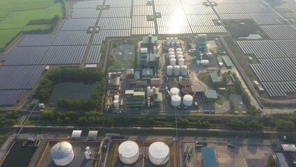 Wall Mural - Aerial view or oil terminal is industrial facility for storage tank of oil and LPG Petrochemical. oil manufacturing products ready for transport and business transportation, LPG Tank, Solar Rooftop	
