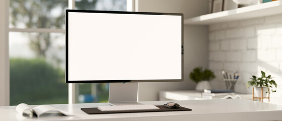 Fototapete - Minimalist white workspace with a white-screen computer mockup on a white desk.