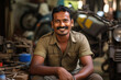 © Neha - Confident indian male worker or mechanic