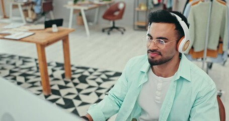 Poster - Music, dance and fashion designer man at work in office with computer for creative planning or research. Smile, energy and headphones with a happy small business or startup employee in a workplace