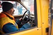 snowplow cab detail, driver operating vehicle