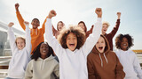Fototapeta  - Group of children wearing hoodies and sweatshirt together smiling looking at camera raising hands in success gesture, teenagers apparel mockup, kids fashion, outdoors photo, classmates