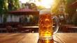 Glass of chilled beer on table and blurred street cafe  background