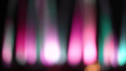 Wall Mural - blurred colorful lines light in dark background