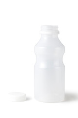 Canvas Print - empty plastic bottle isolated on a white background, containers for juice or milk