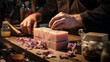 Man is crafting handmade soap bars adorned with dried flowers on a wooden table Profitable Side hustle