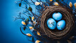 Easter colour eggs in nest on blue background