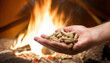 Fiery Embrace: Wood Pellets Ignite Warmth in Hand. Generative AI