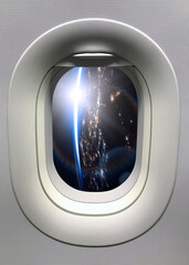 Wall Mural - view from a porthole on the night earth planet. elements of this image furnished by nasa.