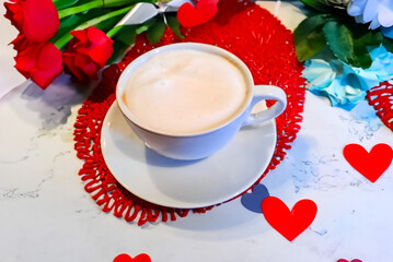 Valentine's day romantic breakfas with cappuccino or coffeet.Romantic background