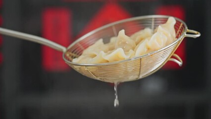 Wall Mural - Chinese New Year eating dumplings, a traditional festival food in China