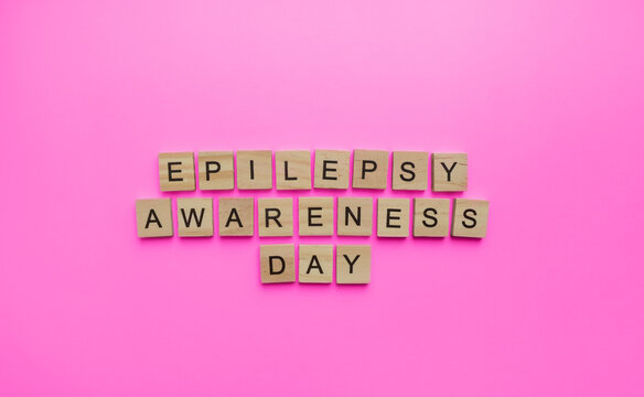 March 26, Epilepsy awareness day, Purple Day, minimalistic banner with wooden lettering