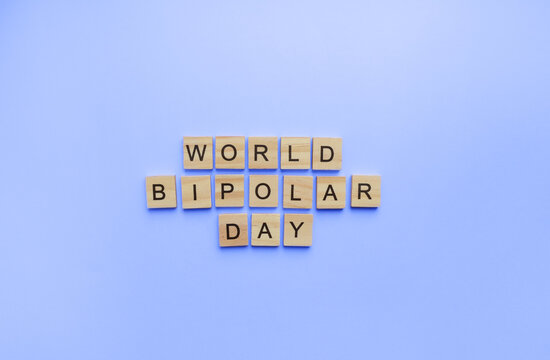 On March 30, World Bipolar Day, a minimalistic banner with an inscription in wooden letters