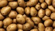 Ein Hintergrundbild von Kartoffeln als endloses Muster.