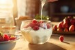 A delicious bowl of yogurt topped with fresh raspberries and strawberries. Perfect for a healthy breakfast or snack