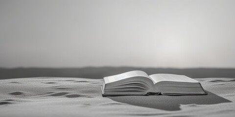 Poster - An open book sitting on top of a bed. Suitable for educational and reading-related themes