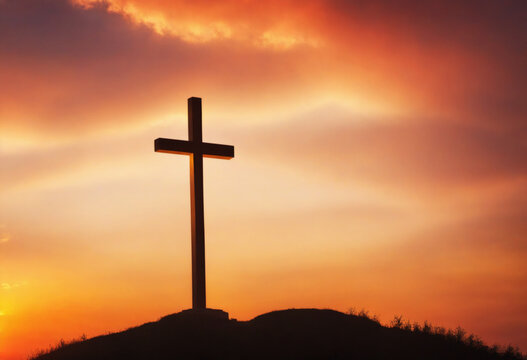 Silhouette of a Cross Against a Blurred Sunset Backdrop