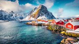 Fototapeta  - attractive morning scene of sakrisoy village norway europe bright winter view of lofoten islads witj typical red wooden houses beautiful seascape of norwegian sea traveling concept background