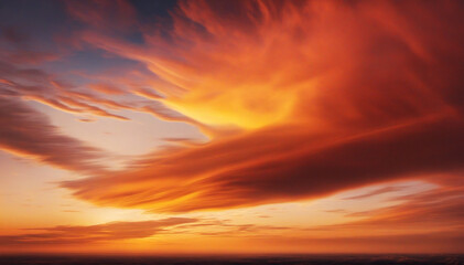 Wall Mural - Abstract orange, red, and yellow backdrop with golden hues over clouds at dusk. Sky landscape with clouds at sunset.