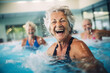 Active senior women enjoying aquafit class in a pool