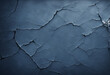 A Dark Blue Grunge Wall with Cracks and Imperfections
