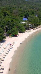 Wall Mural - Aerial drone view at the tropical island Koh Samet Thailand on a sunny day. a tropical bay with turqouse colored ocean