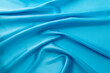 © xy - Close up of light blue silk background