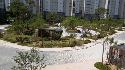 Apartment, landscaping, trees, playground, architecture, city, building, travel, park, yard, sky, city, bridge, home, landscape, tree, palm, waterfront, summer, h2o, street, scenery, river, Spain, cit