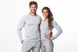 Fototapeta  - A fit and happy couple, wearing winter thermals, engages in athletic training, showcasing strength and vitality.
