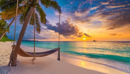 tropical sunset beach and sky background as exotic summer landscape with beach swing or hammock and 