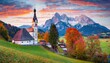 iconic picture of bavaria with maria gern church with hochkalter peak on background fantastic autumn sunrise in alps superb evening landscape of germany countryside traveling concept background